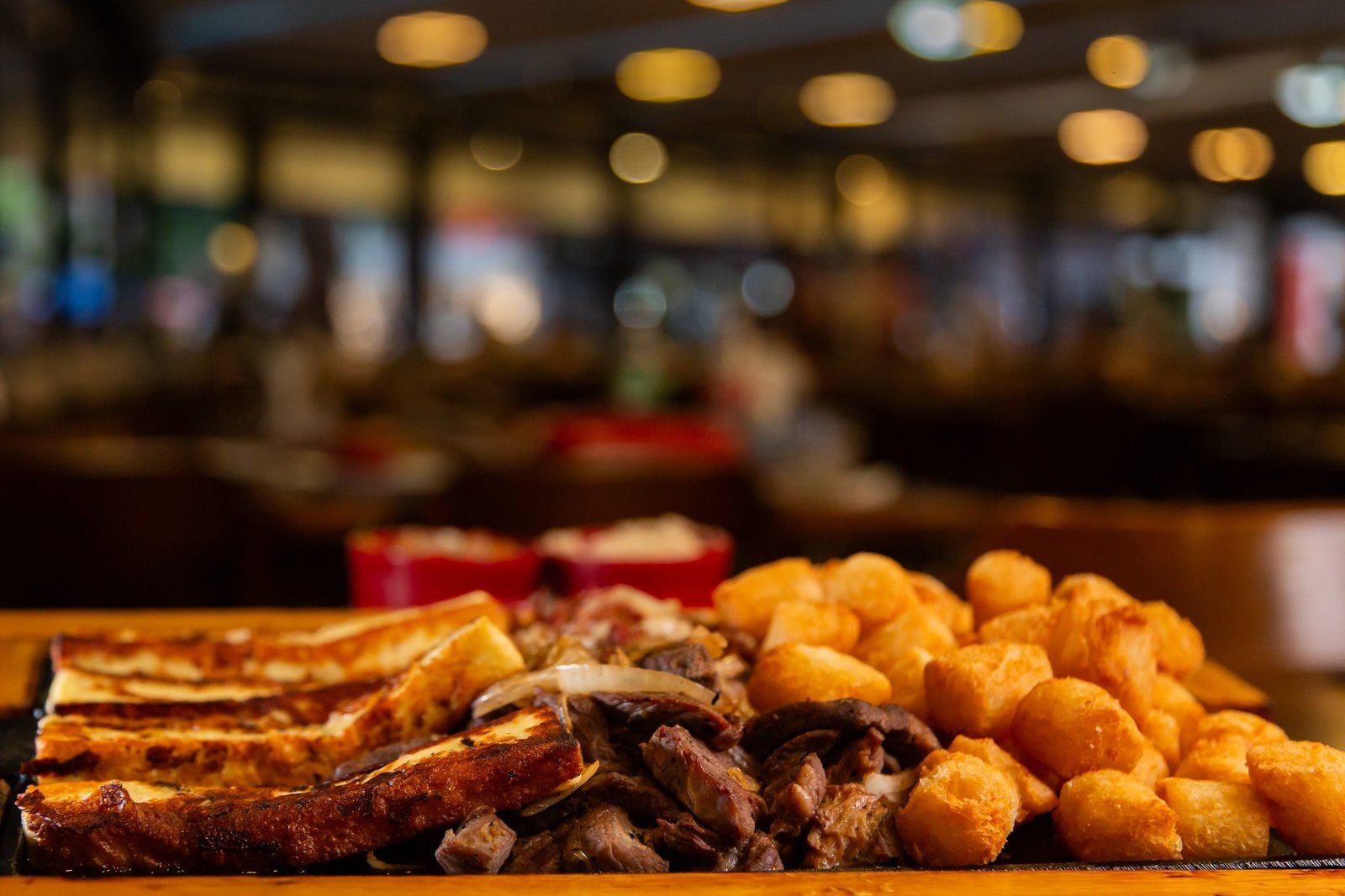 Tábua de petiscos servida na unidade Flamengo do Planalto do Chopp